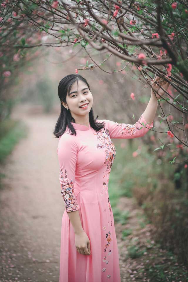 Vietnamese girl in pink ao dai