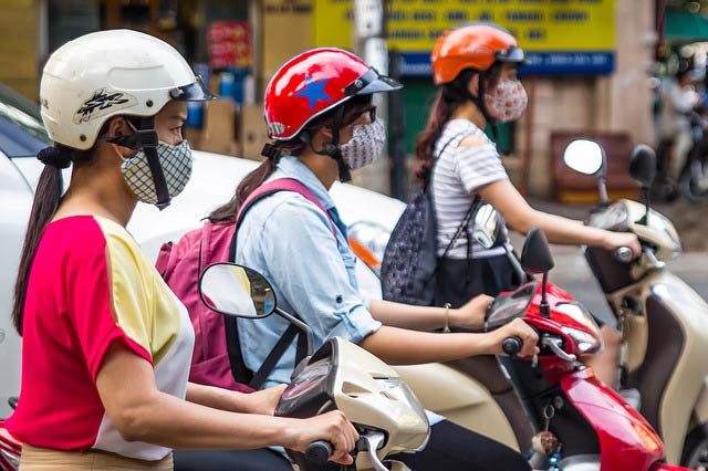 Where to stay in ho chi minh city: girls on scooter