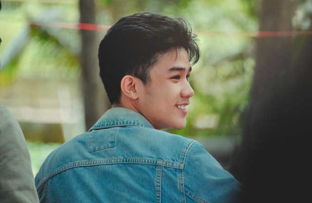 Asian guy smiling