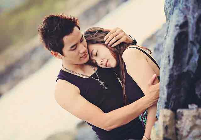 Displays of affection in Vietnam: Asian couple embracing
